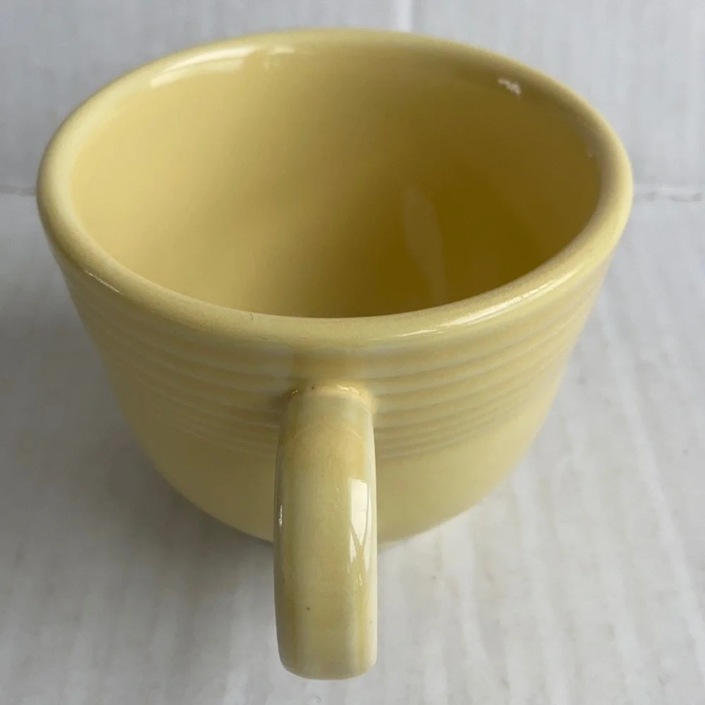 Fiesta yellow tea cup and saucer